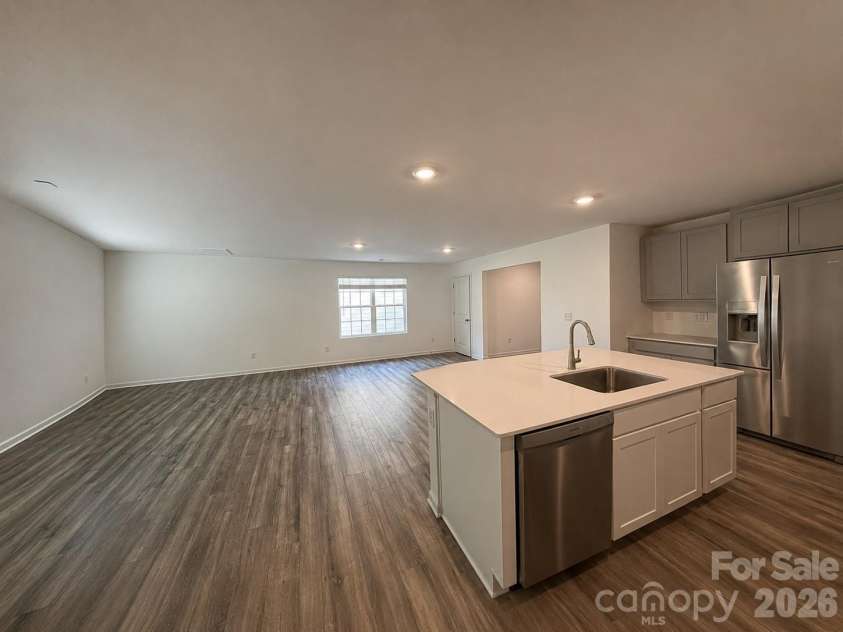 161 Spotted Way, Troutman, NC 28166.  MLS# CAR4406028, YatesRealty ID 41562. Open concept with adjoining breakfast area