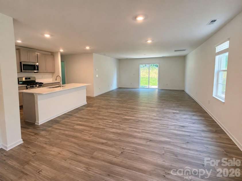 161 Spotted Way, Troutman, NC 28166.  MLS# CAR4406028, YatesRealty ID 41562. Open floorplan with huge living and dining areas