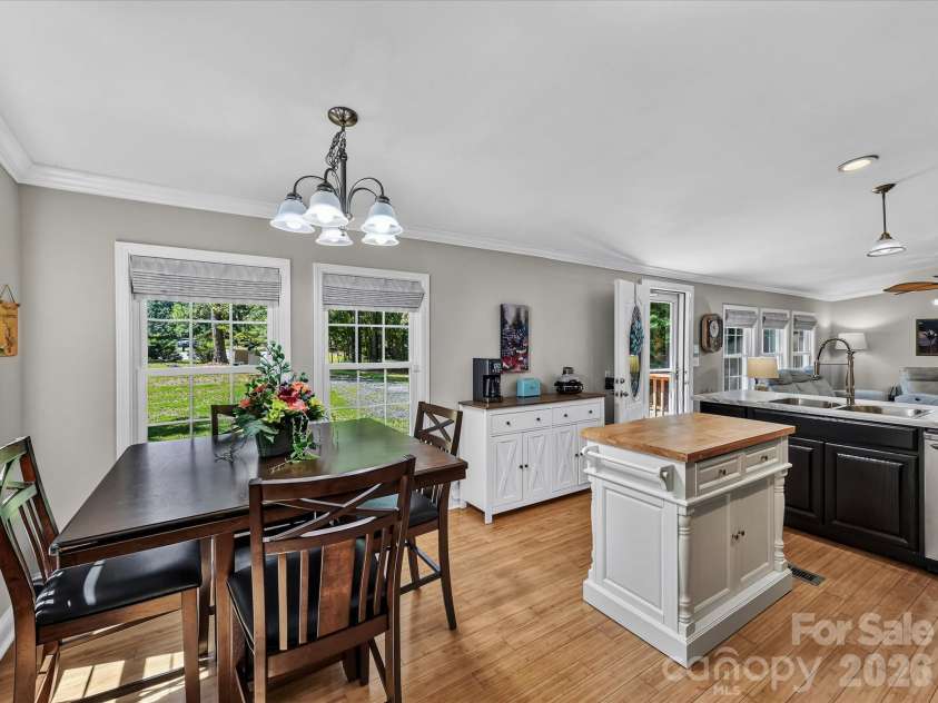 4486 Graybirch Drive, Maiden, NC 28650.  MLS# CAR4409913, YatesRealty ID 41573. Dining Area features plenty of windows with motorized shades.