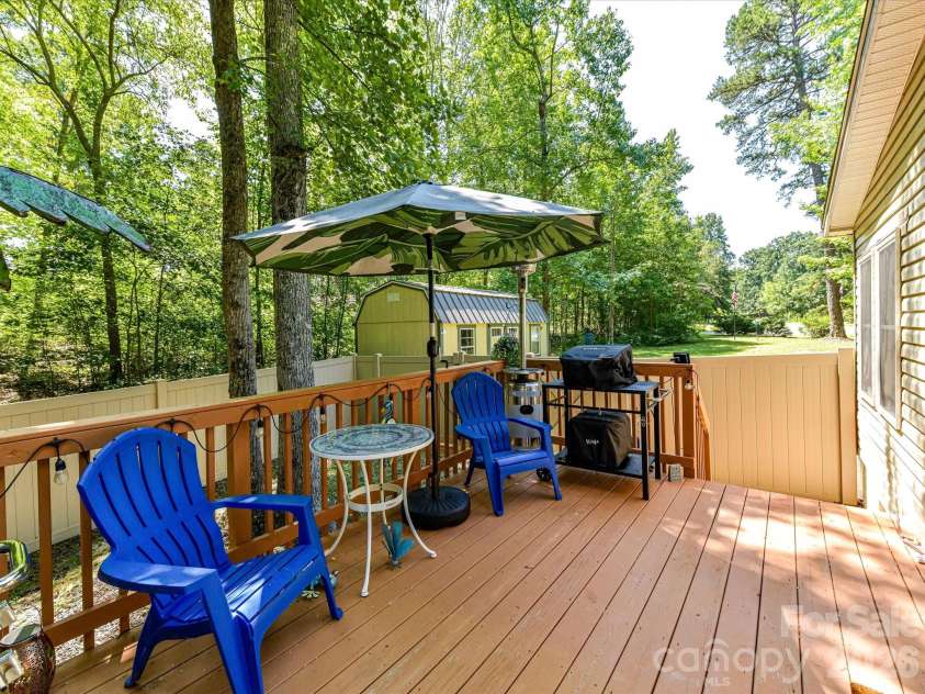 4486 Graybirch Drive, Maiden, NC 28650.  MLS# CAR4409913, YatesRealty ID 41573. Spacious deck is great for relaxing or entertaining while enjoying your peaceful, tranquil property.