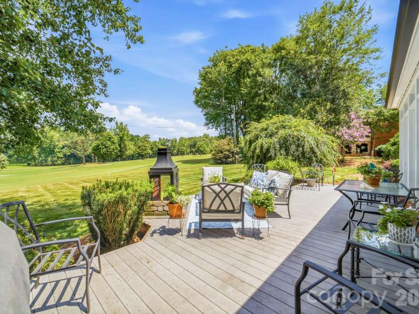 3115 Oakmont Road, Statesville, NC 28625.  MLS# CAR4402709, YatesRealty ID 41574. Large deck overlooking golf course