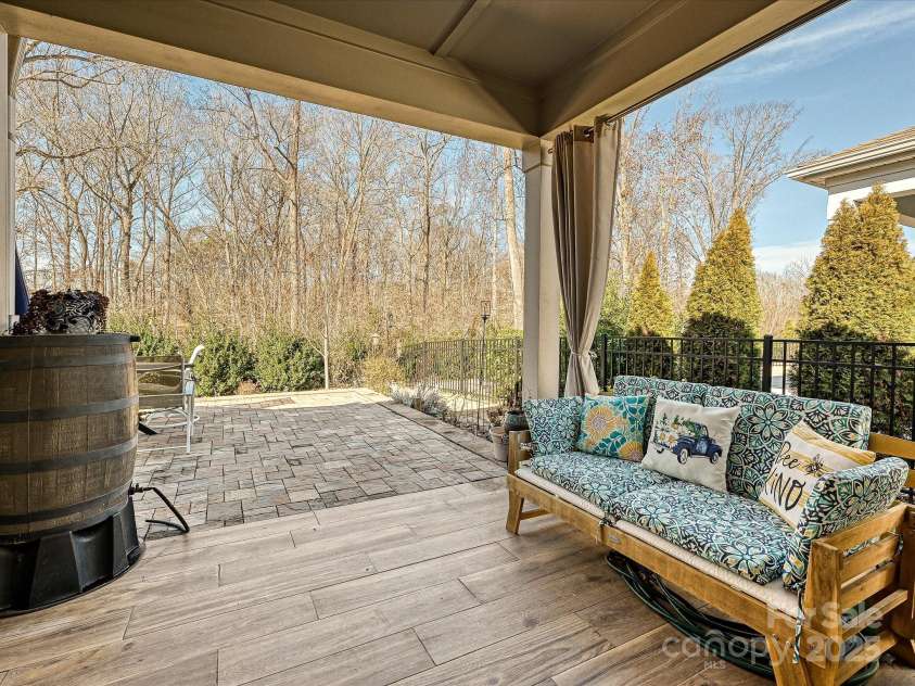 7522 Porrera Street, Charlotte, NC 28214.  MLS# CAR4217175, YatesRealty ID 4158. Covered porch with porcelain tile flooring