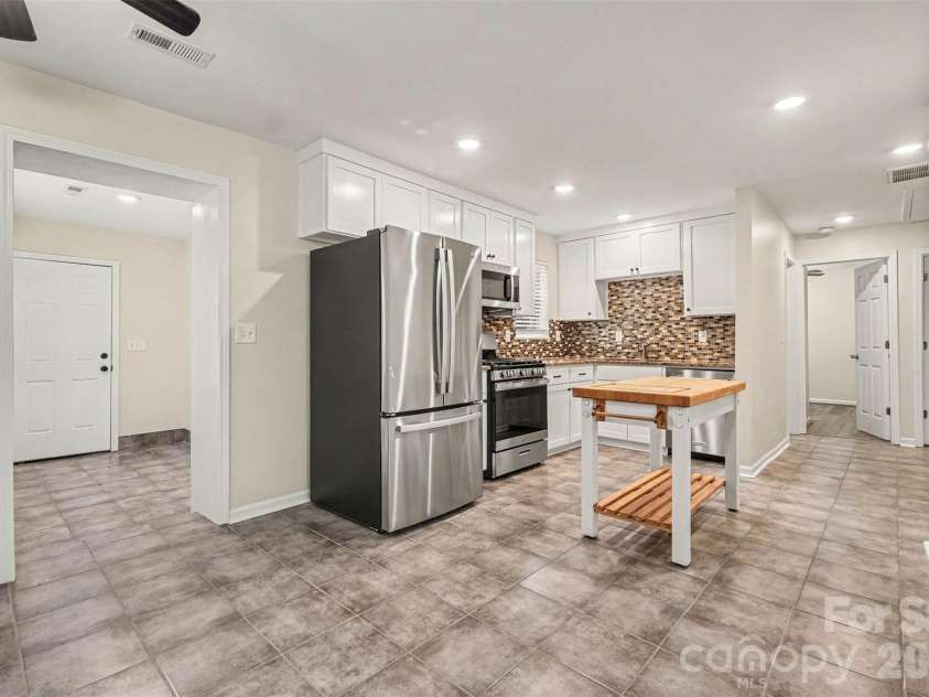 1352 Steed Street, Rock Hill, SC 29732.  MLS# CAR4411220, YatesRealty ID 41581. Dining and kitchen