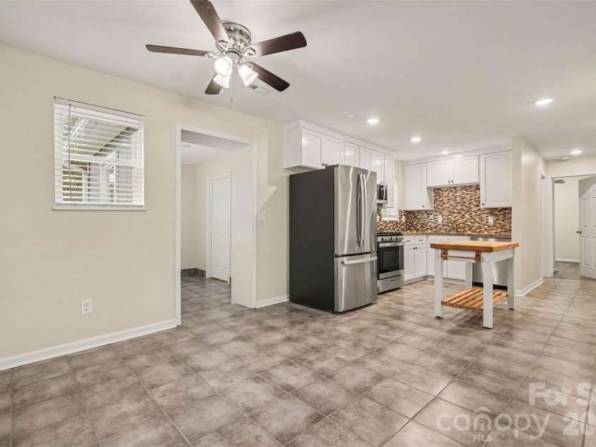 1352 Steed Street, Rock Hill, SC 29732.  MLS# CAR4411220, YatesRealty ID 41581. Dining area into kitchen