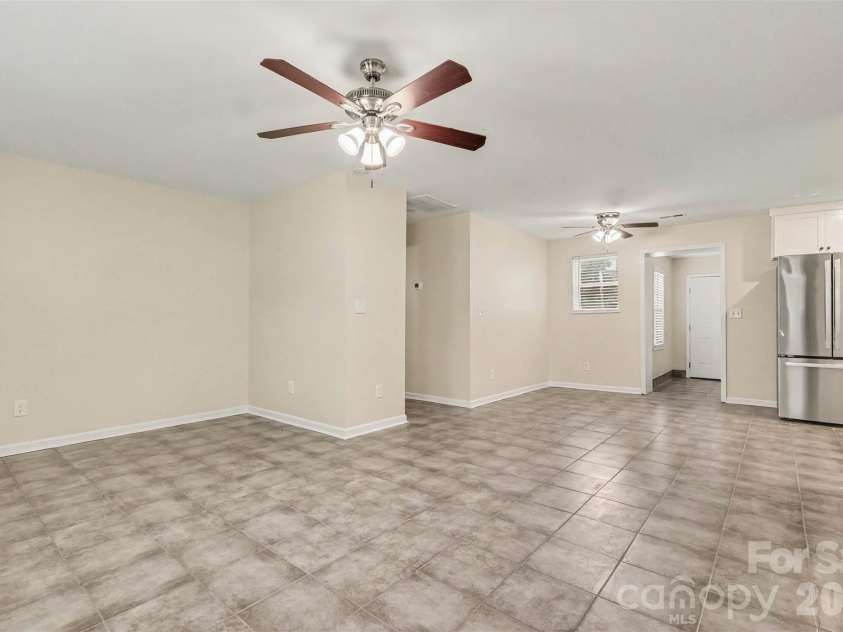 1352 Steed Street, Rock Hill, SC 29732.  MLS# CAR4411220, YatesRealty ID 41581. Open living dining and kitchen
