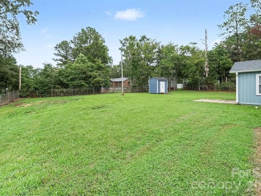 1352 Steed Street, Rock Hill, SC 29732.  MLS# CAR4411220, YatesRealty ID 41581. Spacious Backyard with storage building