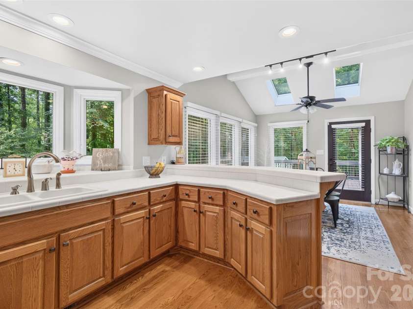 1345 Gaston Day School Road, Gastonia, NC 28056.  MLS# CAR4410332, YatesRealty ID 41583. Expansive windows and skylights