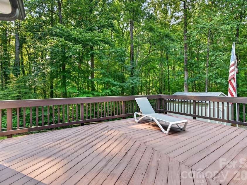 1345 Gaston Day School Road, Gastonia, NC 28056.  MLS# CAR4410332, YatesRealty ID 41583. Exterior back deck off Kitchen over looking fenced back yard