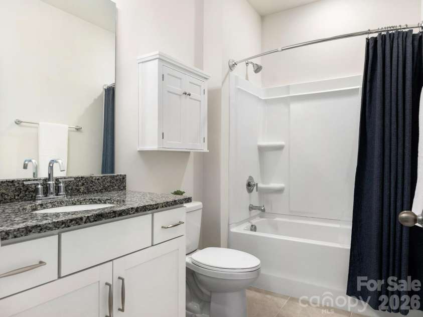 4197 Millstream Road, Denver, NC 28037.  MLS# CAR4408202, YatesRealty ID 41586. Convenient and elegantly designed, this second full bathroom features quality fixtures and finishes. Perfectly positioned to serve guests or secondary bedrooms with efficient, thoughtful design.
