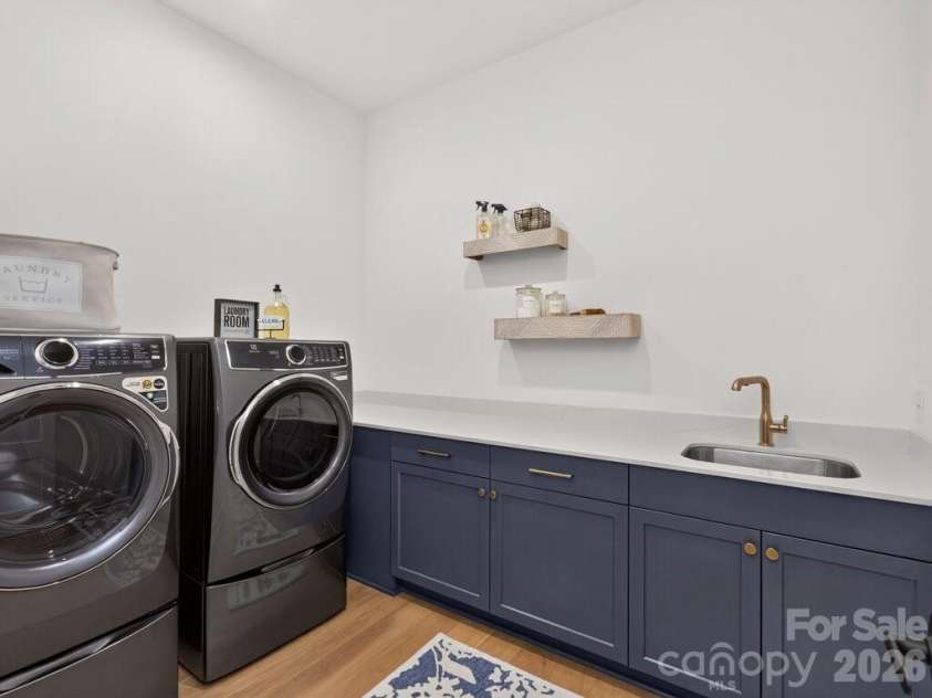3098 Sherman Drive, Lancaster, SC 29720.  MLS# CAR4404508, YatesRealty ID 41590. Laundry with Sink and Cabinetry