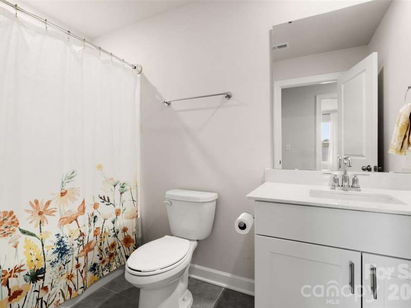 555 Palmarosa Street, Fort Mill, SC 29715.  MLS# CAR4409409, YatesRealty ID 41606. Secondary Bathroom