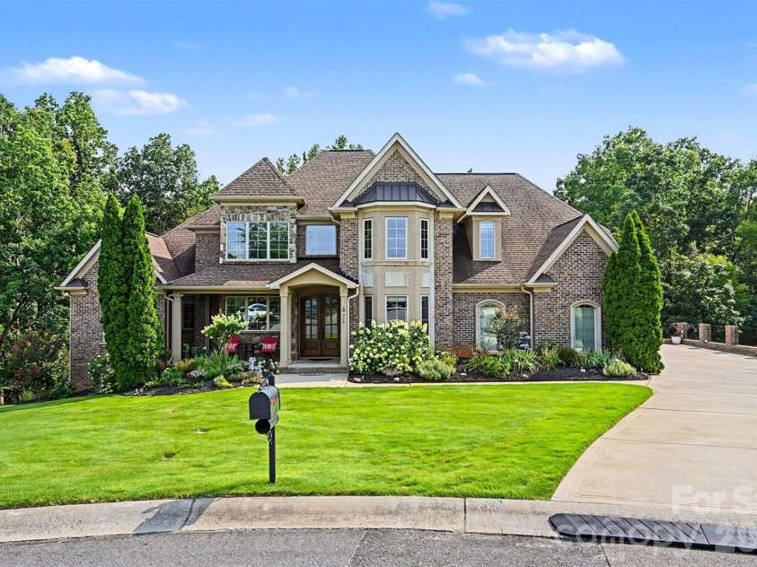470 Swift Creek Cove, Lake Wylie, SC 29710.  MLS# CAR4405807, YatesRealty ID 41611. Stately Front Elevation