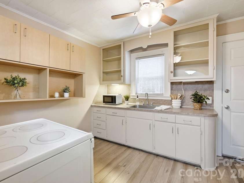 419 Jackson Street, Albemarle, NC 28001.  MLS# CAR4408886, YatesRealty ID 41626. Cozy kitchen with built-in storage