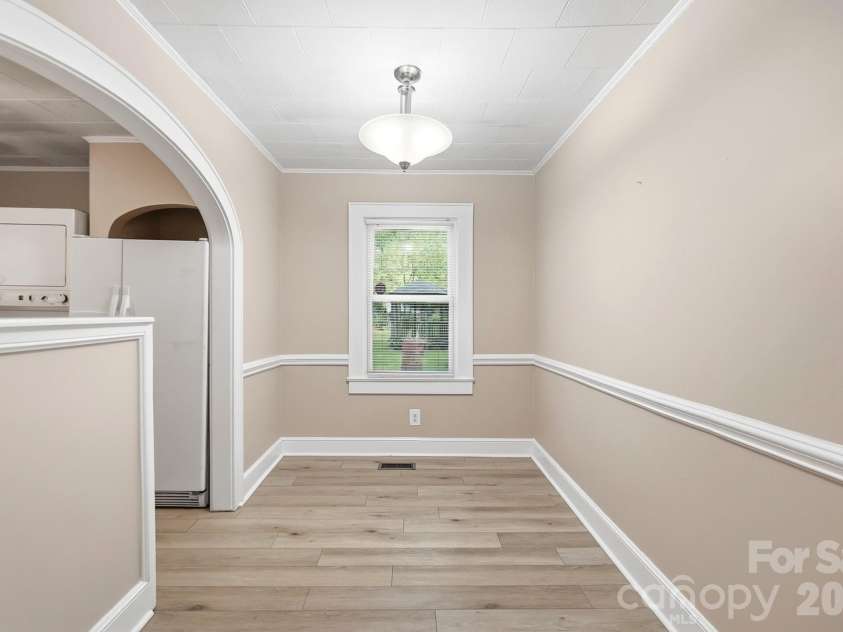 419 Jackson Street, Albemarle, NC 28001.  MLS# CAR4408886, YatesRealty ID 41626. Dining room opens to the kitchen