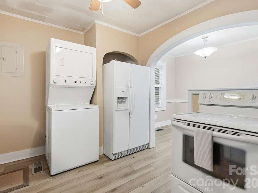419 Jackson Street, Albemarle, NC 28001.  MLS# CAR4408886, YatesRealty ID 41626. Kitchen looking into dining room