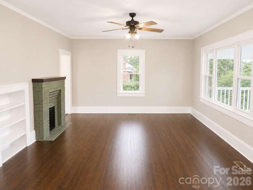 105 Inman Avenue, Bessemer City, NC 28016.  MLS# CAR4337137, YatesRealty ID 4163. Living room with Antique Fire Place
