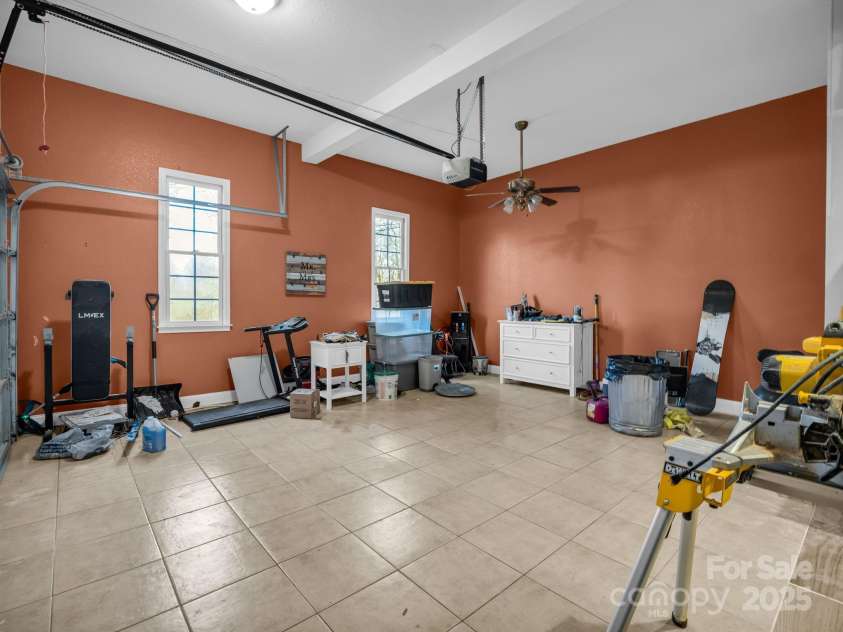 351 Rambling Creek, Tryon, NC 28782.  MLS# CAR4327105, YatesRealty ID 4163. 2-Car Garage with tile floor