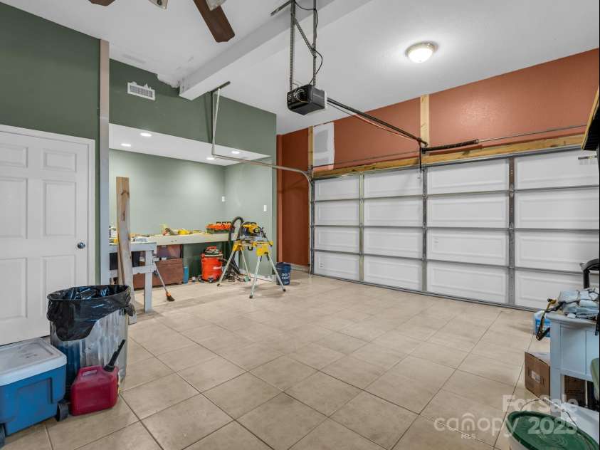 351 Rambling Creek, Tryon, NC 28782.  MLS# CAR4327105, YatesRealty ID 4163. 2-Car Garage with tile floor