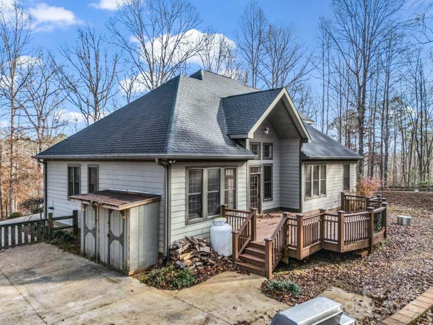 351 Rambling Creek, Tryon, NC 28782.  MLS# CAR4327105, YatesRealty ID 4163. Enjoy outdoor activities and entertaining on the spacious deck