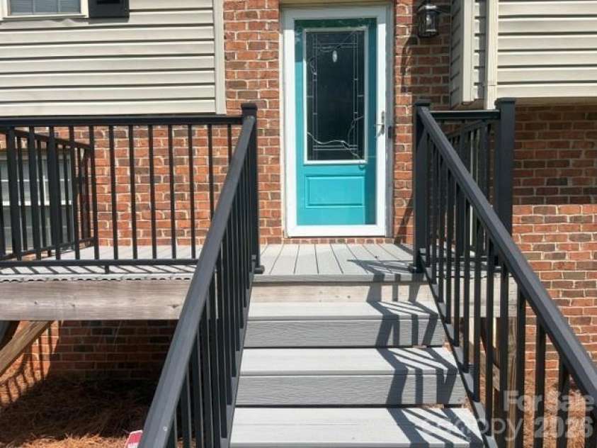 362 Mt Herman Road, Hudson, NC 28638.  MLS# CAR4410654, YatesRealty ID 41631. Composite decking and metal railing