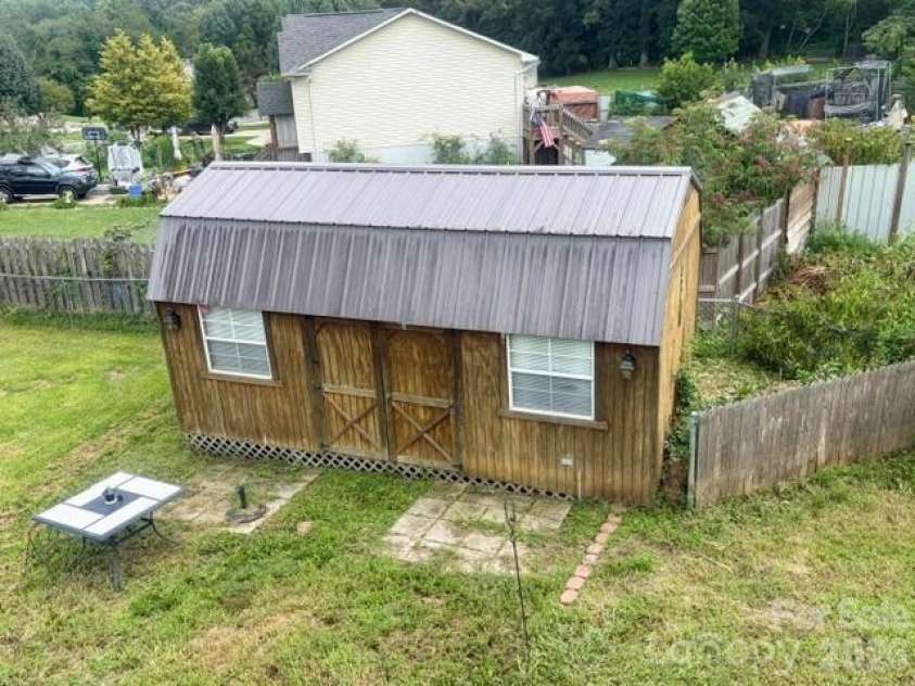 362 Mt Herman Road, Hudson, NC 28638.  MLS# CAR4410654, YatesRealty ID 41631. Large storage builidng!