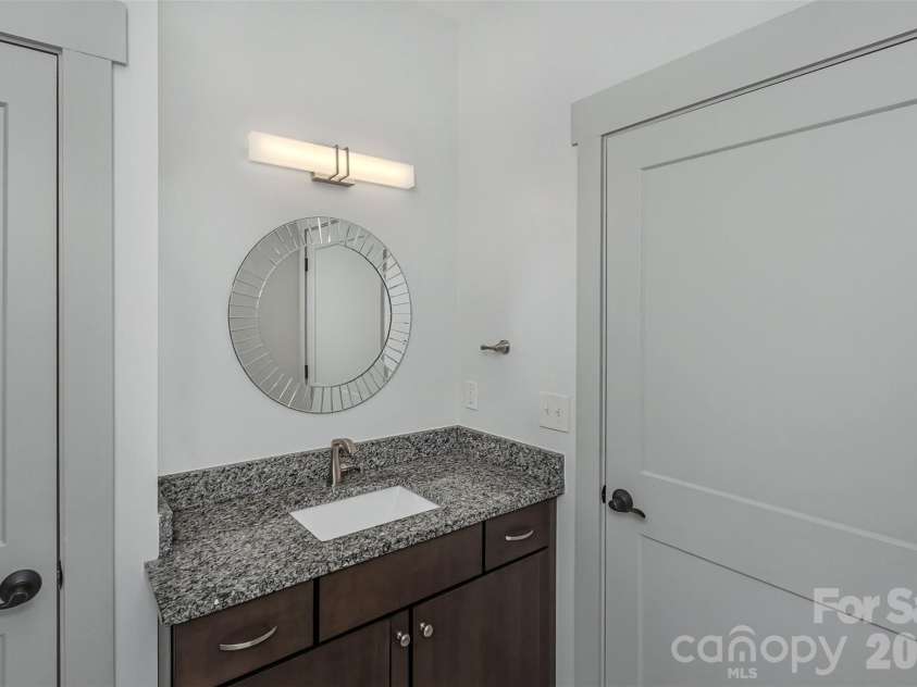 157 Copper Valley Lane, Hendersonville, NC 28739.  MLS# CAR4401396, YatesRealty ID 41639. Private Guest Bath