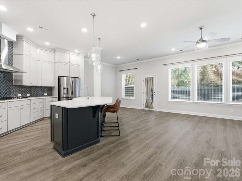 8018 Houser Street, Cornelius, NC 28031.  MLS# CAR4321846, YatesRealty ID 4164. Large, bright, open concept kitchen & living room