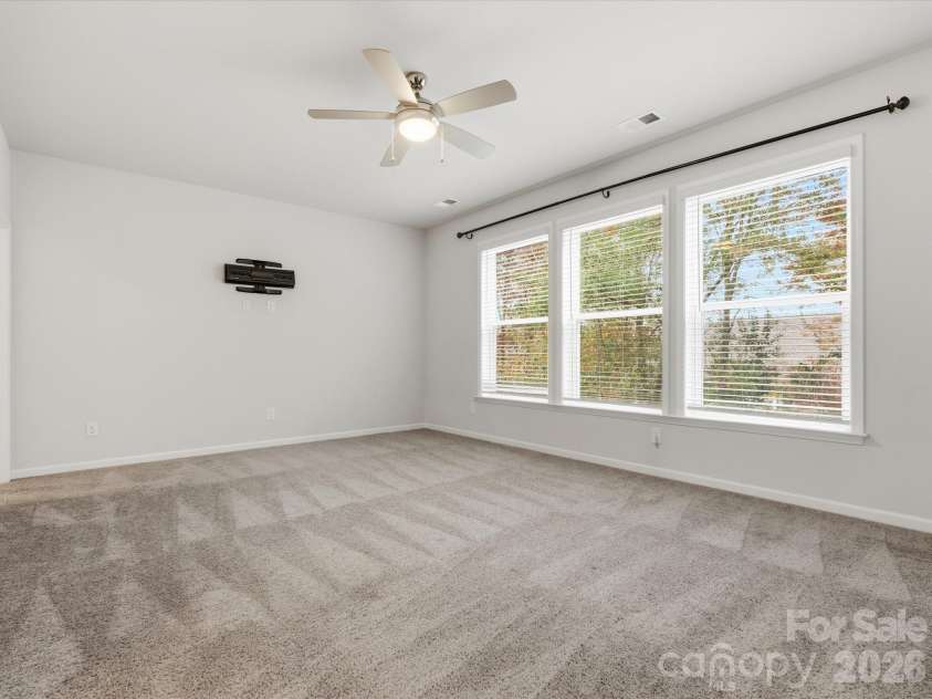 8018 Houser Street, Cornelius, NC 28031.  MLS# CAR4321846, YatesRealty ID 4164. Primary bedroom