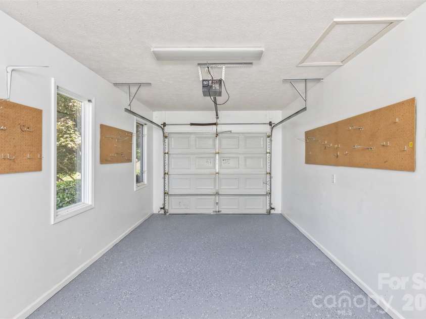 100 Titleist Way, Hendersonville, NC 28739.  MLS# CAR4407640, YatesRealty ID 41644. Epoxy coated 1Car+ garage