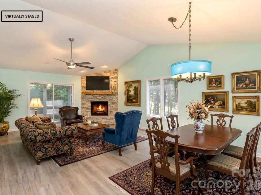 100 Titleist Way, Hendersonville, NC 28739.  MLS# CAR4407640, YatesRealty ID 41644. Virtual Staged Living & Dining