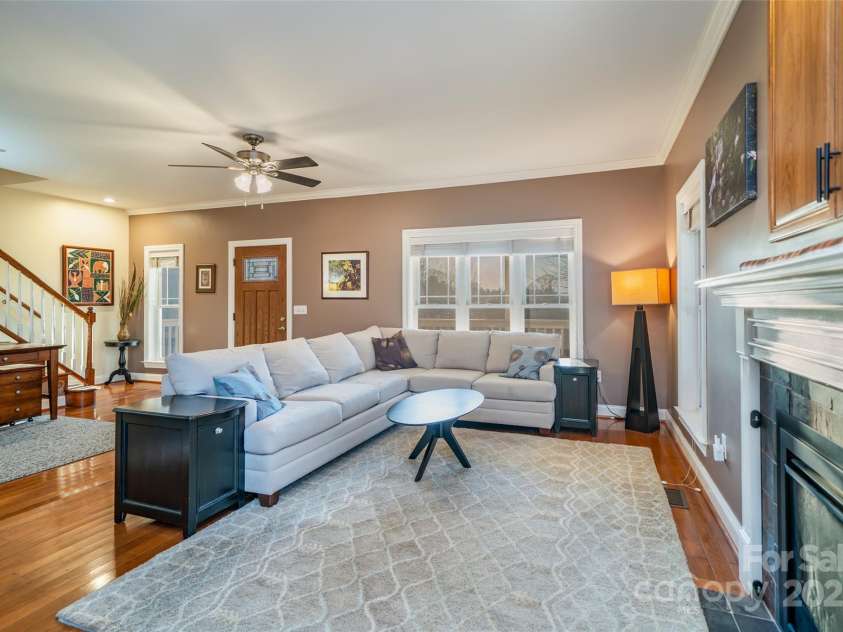 11 Forest Park Lane, Asheville, NC 28803.  MLS# CAR4321973, YatesRealty ID 4165. Living room w/gas fireplace