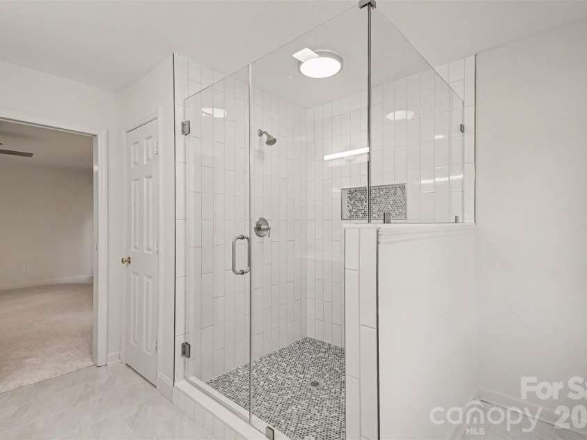 13520 Andulusian Drive, Matthews, NC 28105.  MLS# CAR4409742, YatesRealty ID 41651. With a HUGE custom walk-in shower.