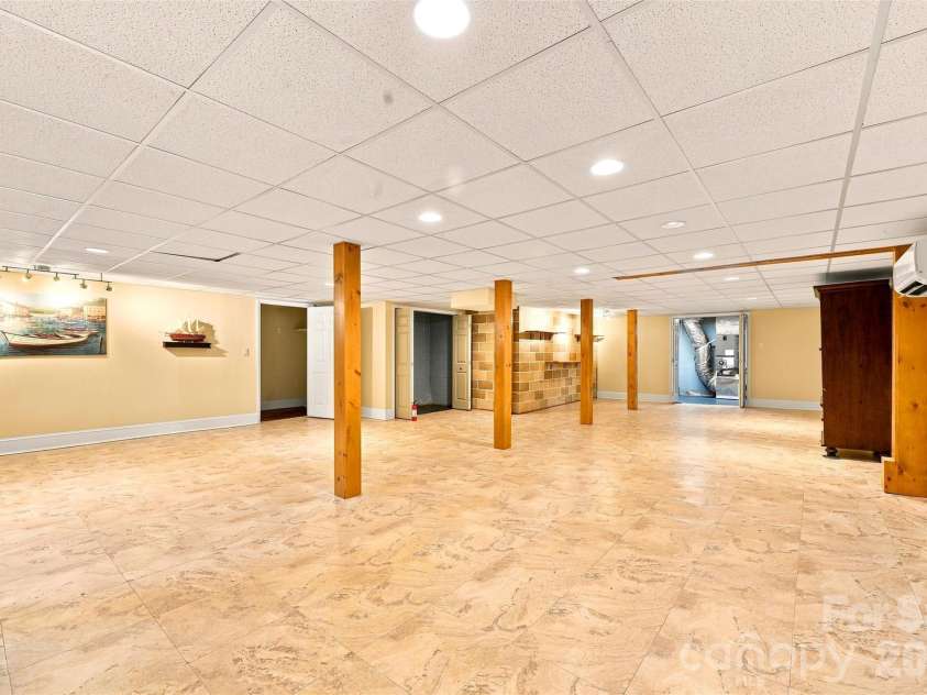 199 Bethlehem Manufacturing Lane, Hickory, NC 28601.  MLS# CAR4406517, YatesRealty ID 41654. Basement Entertainmet Room