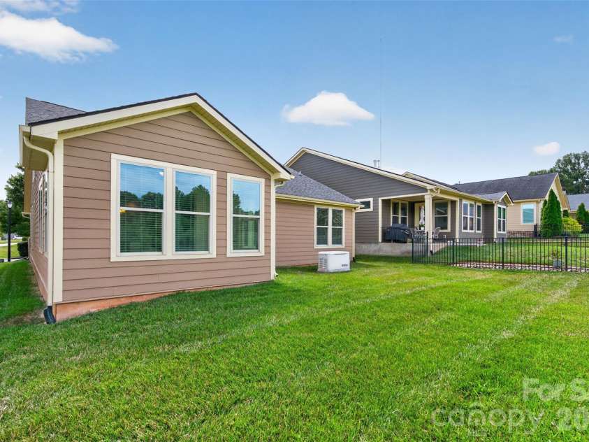 127 Johnson Manor Street, Mooresville, NC 28115.  MLS# CAR4407798, YatesRealty ID 41663. Flat backyard