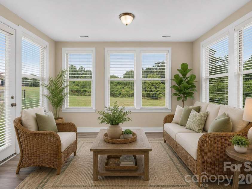 127 Johnson Manor Street, Mooresville, NC 28115.  MLS# CAR4407798, YatesRealty ID 41663. Virtually staged sunroom