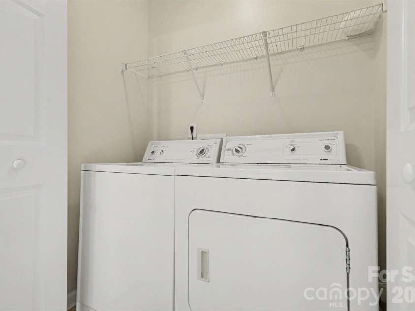 6124 Warrior Avenue, Fort Mill, SC 29707.  MLS# CAR4397314, YatesRealty ID 41666. Laundry Room in Hall