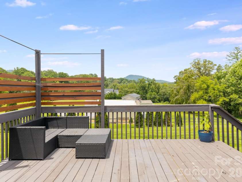 21 Old Pinner Place, Arden, NC 28704.  MLS# CAR4407827, YatesRealty ID 41672. Back deck for grilling and chilling