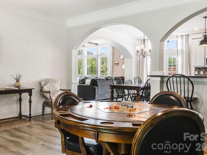 21 Old Pinner Place, Arden, NC 28704.  MLS# CAR4407827, YatesRealty ID 41672. Game room opens to the kitchen