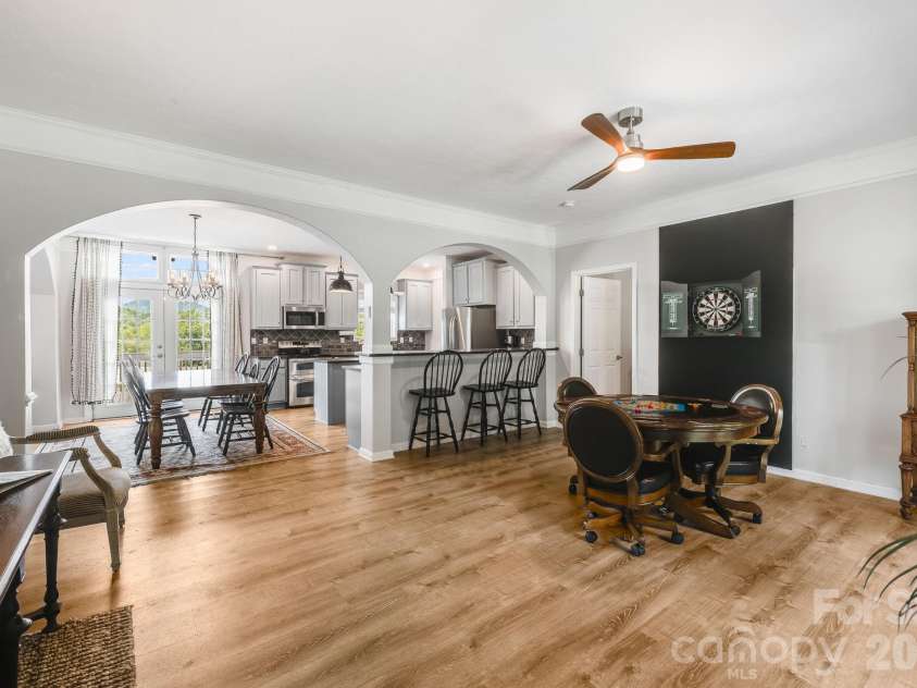 21 Old Pinner Place, Arden, NC 28704.  MLS# CAR4407827, YatesRealty ID 41672. Game room with card table/game table and darts