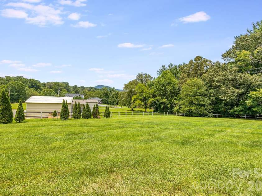 21 Old Pinner Place, Arden, NC 28704.  MLS# CAR4407827, YatesRealty ID 41672. Massive flat and cleared yard