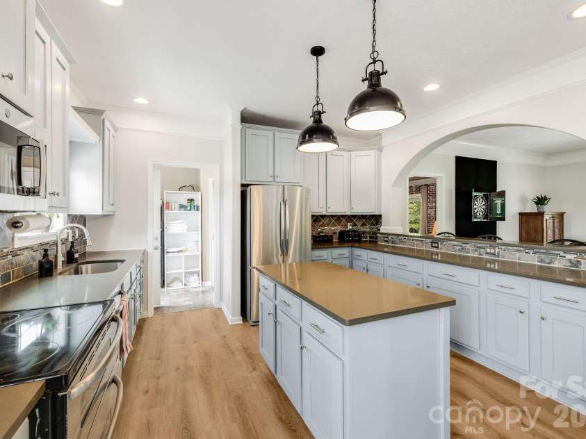 21 Old Pinner Place, Arden, NC 28704.  MLS# CAR4407827, YatesRealty ID 41672. Plenty of room for entertaining