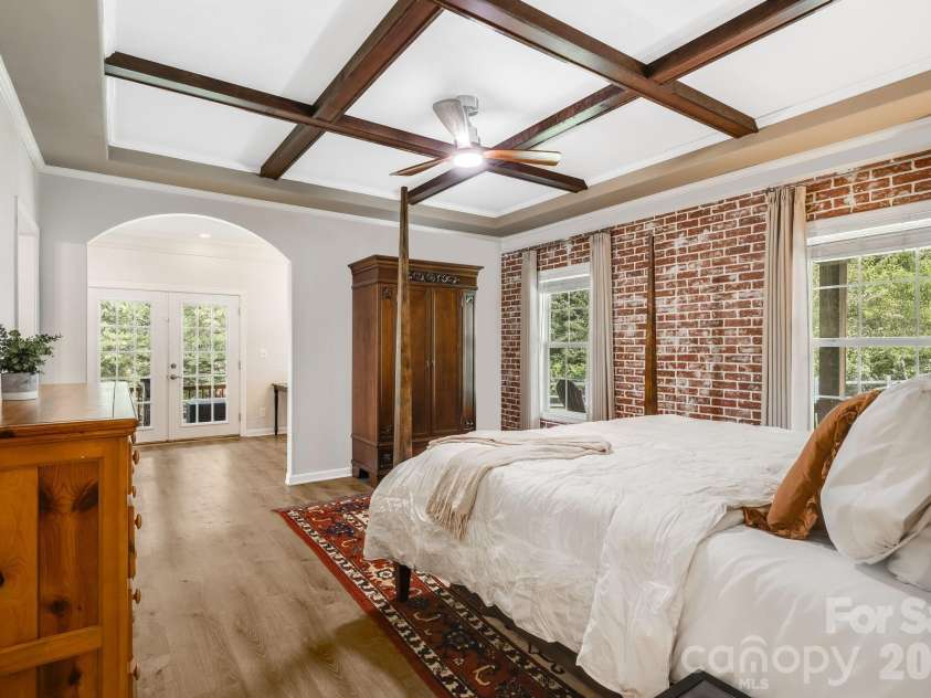 21 Old Pinner Place, Arden, NC 28704.  MLS# CAR4407827, YatesRealty ID 41672. Primary bedroom