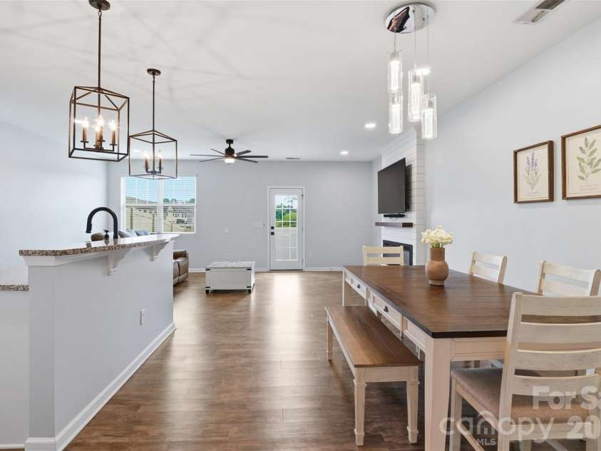 2614 Winter Thistle Way, Fort Mill, SC 29707.  MLS# CAR4410501, YatesRealty ID 41675. Dining Area intoLiving Area