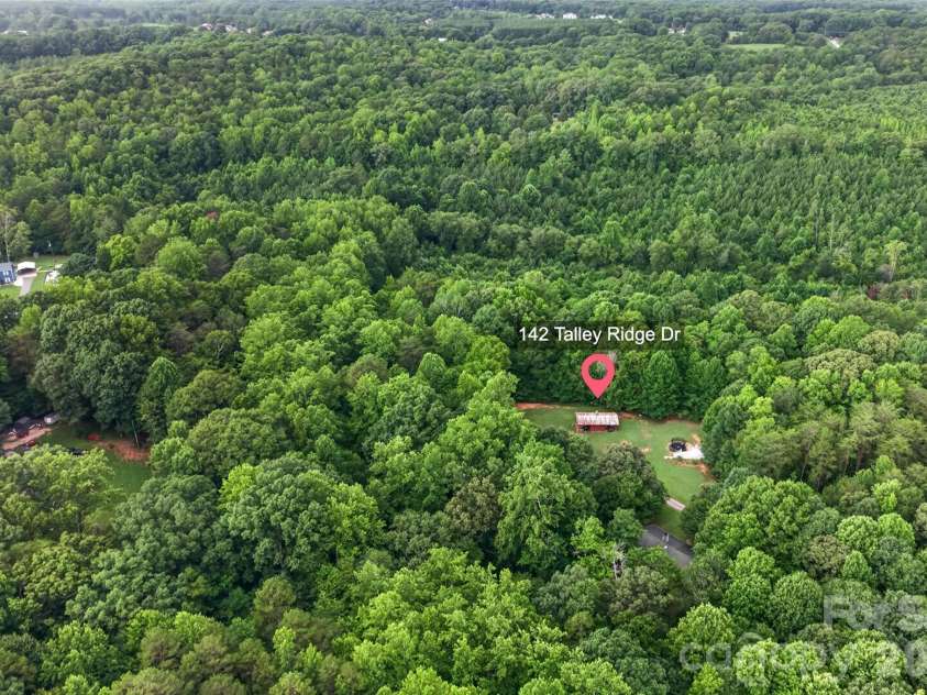142 Talley Ridge Drive, Troutman, NC 28166.  MLS# CAR4407328, YatesRealty ID 41676. 5 private acres