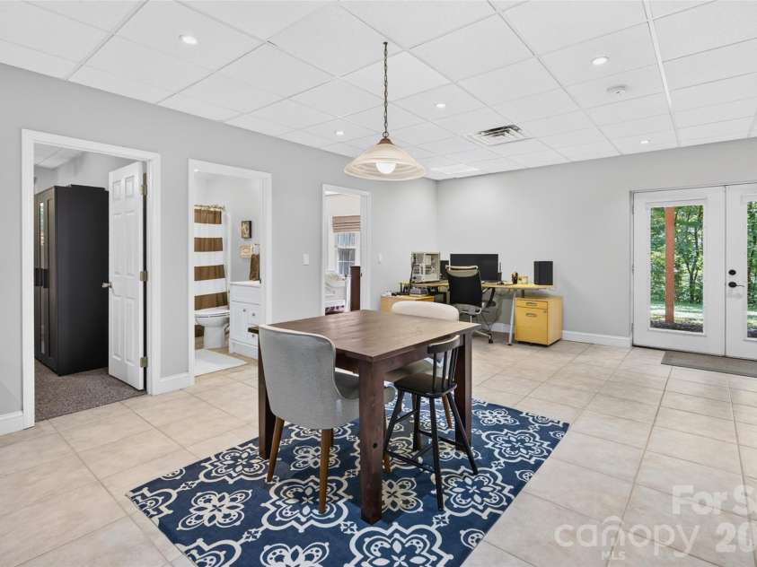 142 Talley Ridge Drive, Troutman, NC 28166.  MLS# CAR4407328, YatesRealty ID 41676. Lower Level office/dining space