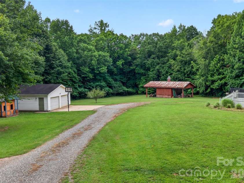 142 Talley Ridge Drive, Troutman, NC 28166.  MLS# CAR4407328, YatesRealty ID 41676. Shop and Tractor Shed