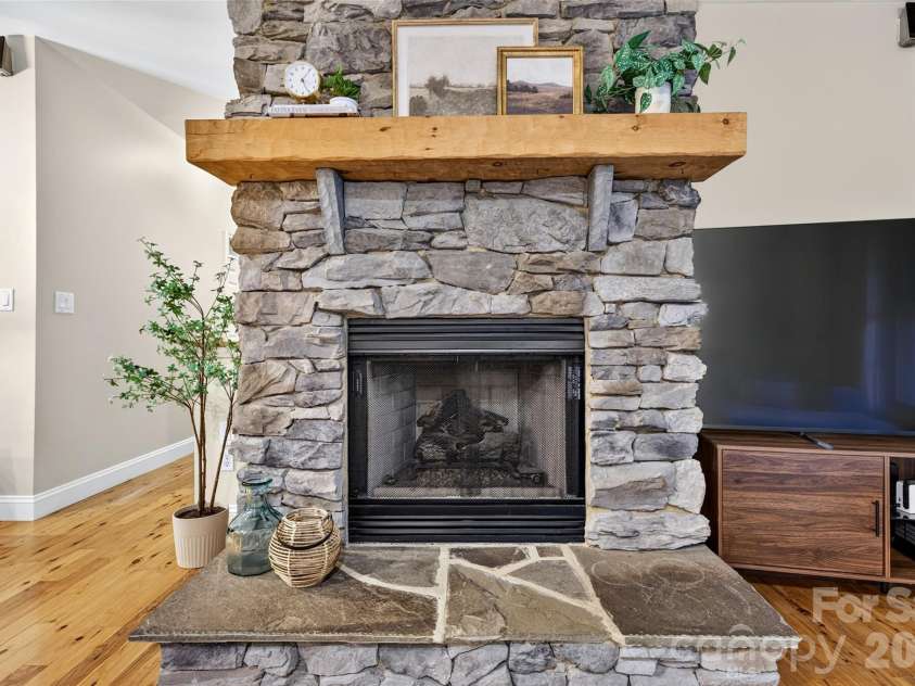 142 Talley Ridge Drive, Troutman, NC 28166.  MLS# CAR4407328, YatesRealty ID 41676. Stacked Stone Wood Burning Fireplace