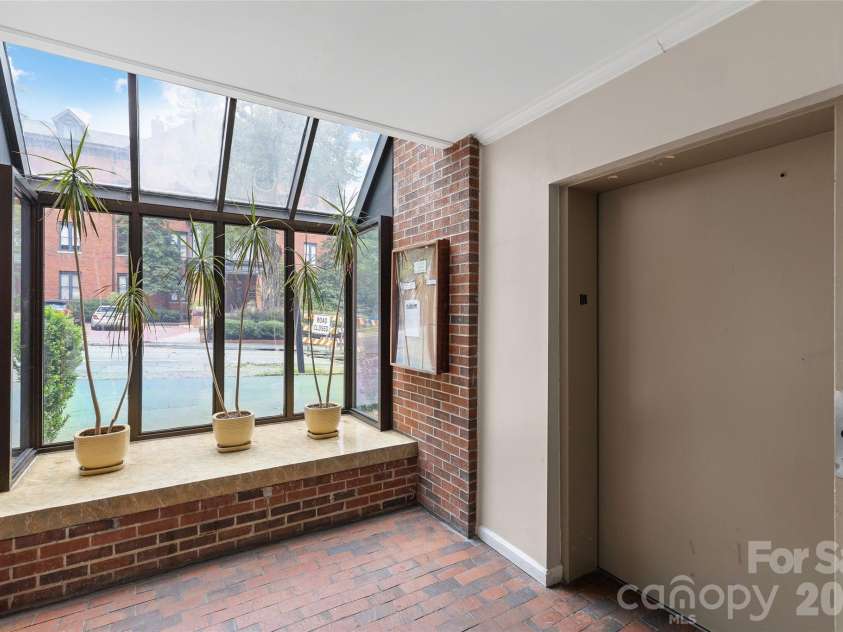224 Poplar Street, Charlotte, NC 28202.  MLS# CAR4409440, YatesRealty ID 41677. Main condo elevator