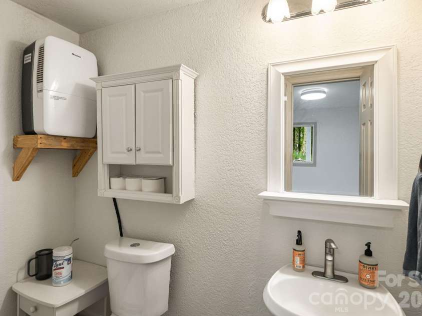 129 Finney Lane, Mars Hill, NC 28754.  MLS# CAR4409260, YatesRealty ID 41683. Downstairs Half Bath
