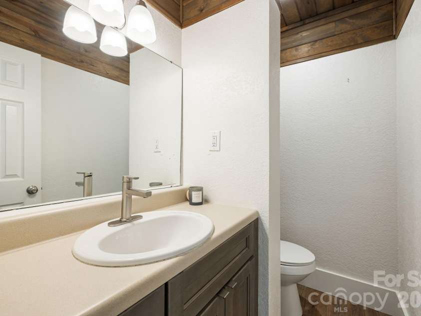 129 Finney Lane, Mars Hill, NC 28754.  MLS# CAR4409260, YatesRealty ID 41683. Main Level Guest Half Bath